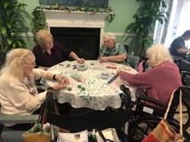 Assisted Living & Integrated Memory Care Community Cabot Cove of Largo Welcomes You assisted living residents playing bingo