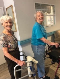 Resources assisted living residents walking the hall to exercise