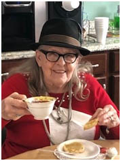 original home page before layout changes cabot cove assisted living resident drinking tea