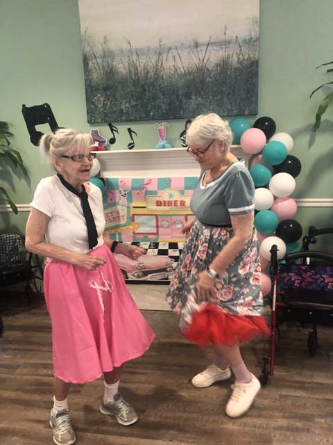 Header assisted living dance party fun