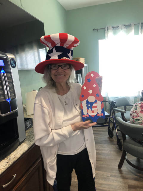 Header happy assisted living resident celebrating